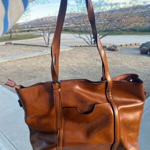 Elegant Brown Leather Tote Bag with matching wallet